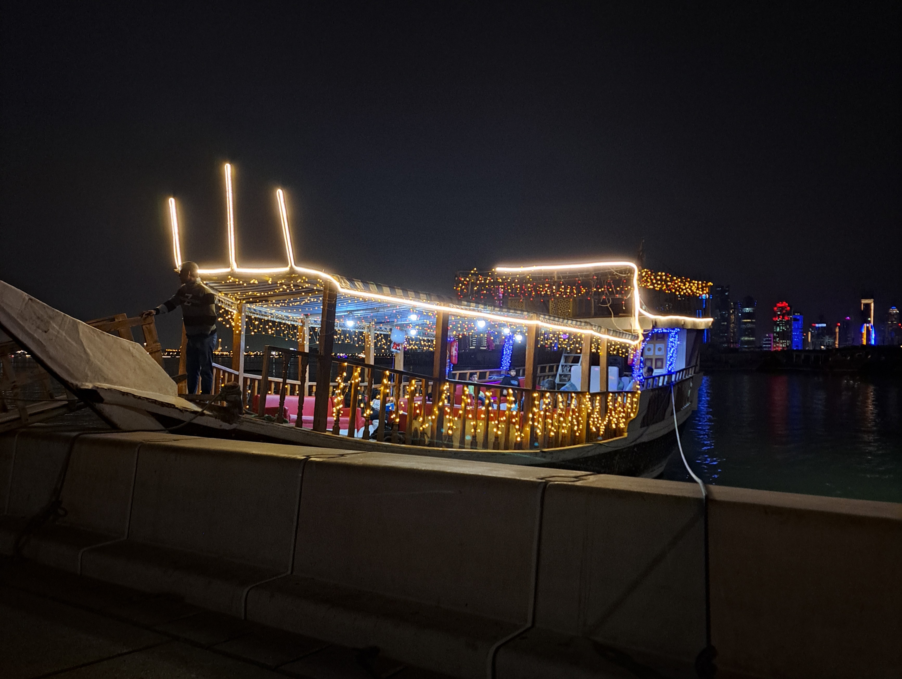Lite up dhow in the Doha Bay at night